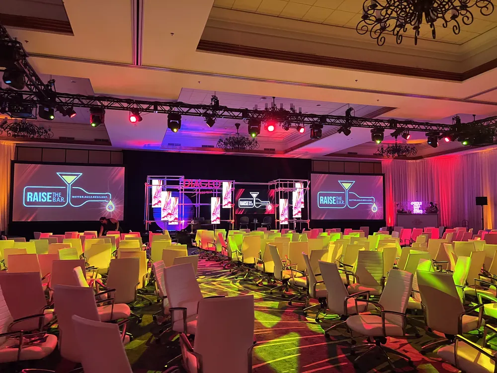 Conference stage, screens and lighting for Diageo's Raise the Bar